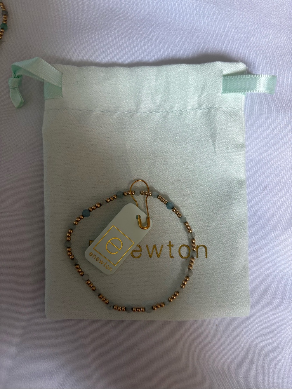 eNewton Gold with grey and teal gemstones - Picture 2 of 2